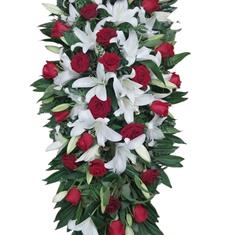 Red rose and lily casket spray