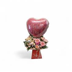 Bear and balloon floral arrangement