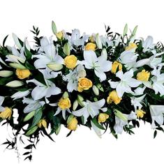 yellow rose and white lily casket spray